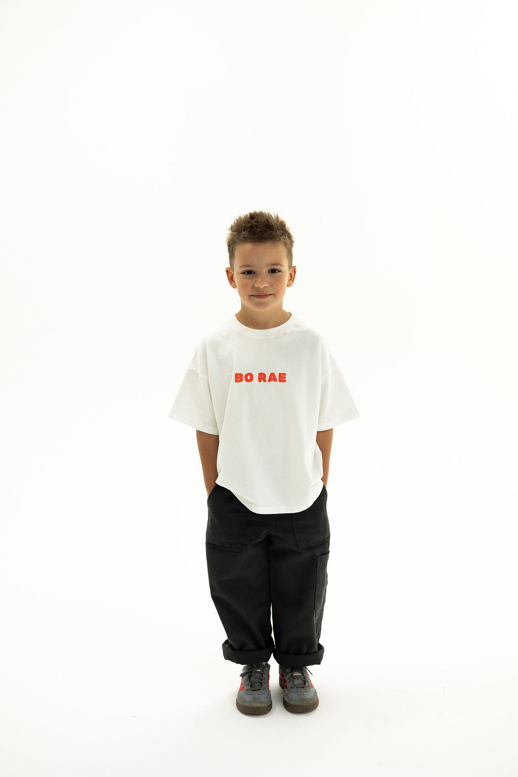 BO RAE How Lucky Are We oversized kids T-shirt in white, front view with red chest logo.
