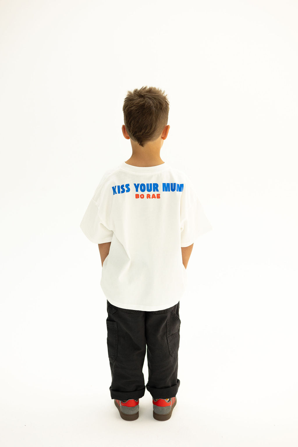 BO RAE How Lucky Are We oversized kids T-shirt in white, back view featuring large blue and red graphic print