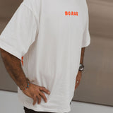Close-up of BO RAE How Lucky Are We oversized unisex adult T-shirt in white with Red chest logo